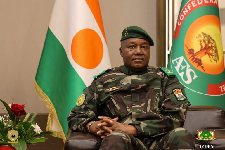 reuters_6a34dc83-1781849219 The head of the Nigerien junta, General Abdourahamane Tiani, looks on as he welcomes Beninese President Romuald Wadagni during the first leg of a visit to Niger and Burkina Faso, in Niamey, Niger June 2, 2026. Niger Presidency/Handout via REUTERS THIS IMAGE HAS BEEN SUPPLIED BY A THIRD PARTY. LOGO FROM SOURCE