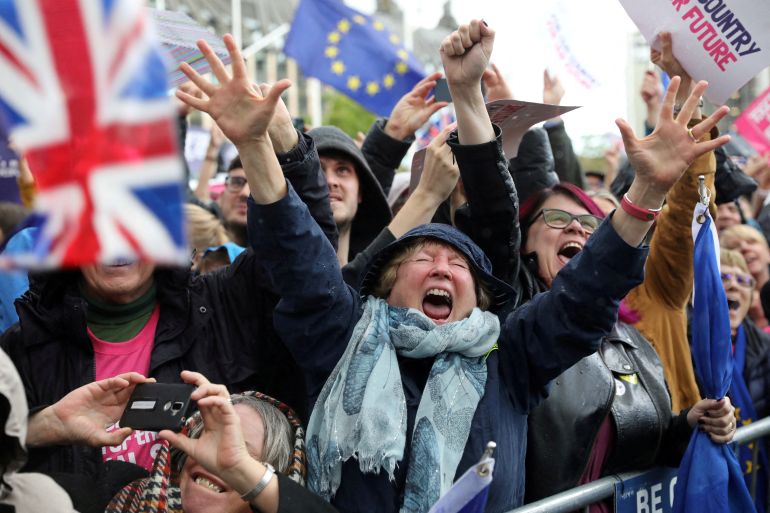 FILE PHOTO: EU supporters react after the result of the vote on the deal delay was announced at the House of Commons as parliament sits on a Saturday for the first time since the 1982 Falklands War, to discuss Brexit in London, Britain, October 19, 2019. REUTERS/Simon Dawson/File Photo