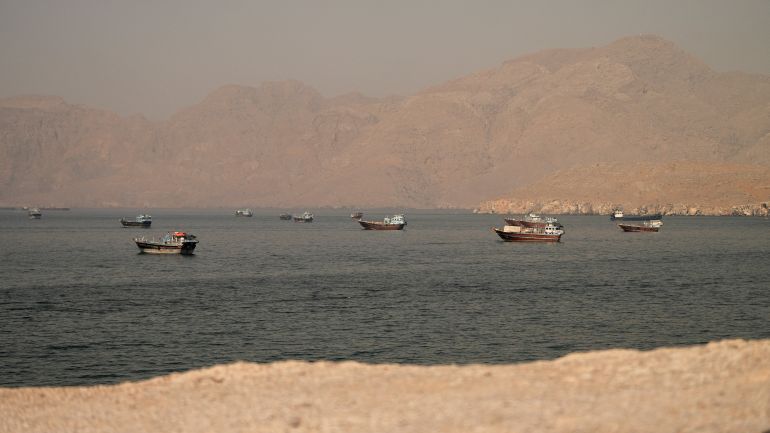 reuters_6a36f2f4-1781986036 Vessels at the Strait of Hormuz, as seen from Musandam, Oman, June 18, 2026. REUTERS/Stringer TPX IMAGES OF THE DAY