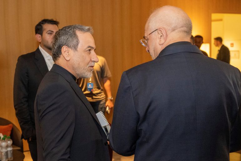 Minister of Foreign Affairs of Iran, Seyyed Abbas Araghchi, left, and Speaker of the Islamic Parliament of Iran, Mohammad Bagher Ghalibaf, right, at the Buergenstock resort in Obbuergen, near Lucerne, Switzerland, Sunday, June 21, 2026. URS FLUEELER/Pool via REUTERS
