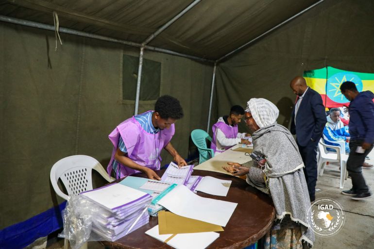 reuters_6a383e7c-1782070908 National Election Board of Ethiopia (NEBE) officials process a voter before casting her ballot at a polling station during the parliamentary and regional elections in Addis Ababa, Ethiopia, June 1, 2026. The Intergovernmental Authority on Development (IGAD)/Handout via REUTERS THIS IMAGE HAS BEEN SUPPLIED BY A THIRD PARTY. Reuters has not been able to report from inside Ethiopia since mid-February, when the Ethiopian Media Authority declined to renew the accreditation for its three Addis Ababa-based journalists.