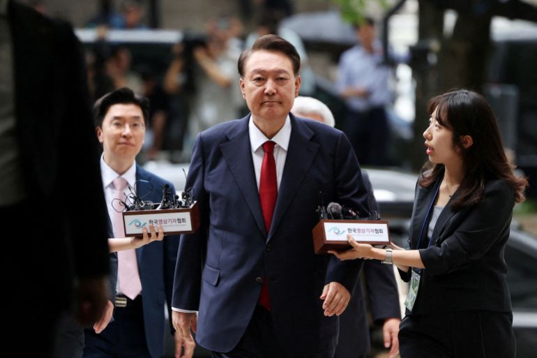 FILE PHOTO: Former South Korean President Yoon Suk Yeol arrives at a court to attend a hearing to review his arrest warrant requested by special prosecutors in Seoul, South Korea, July 9, 2025. REUTERS/Kim Hong-Ji/Pool/File Photo