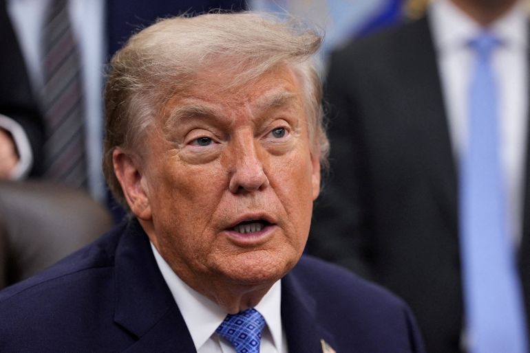 FILE PHOTO: U.S. President Donald Trump speaks as he sits in the Oval Office of the White House in Washington, D.C., U.S., June 26, 2026. REUTERS/Ken Cedeno/File Photo