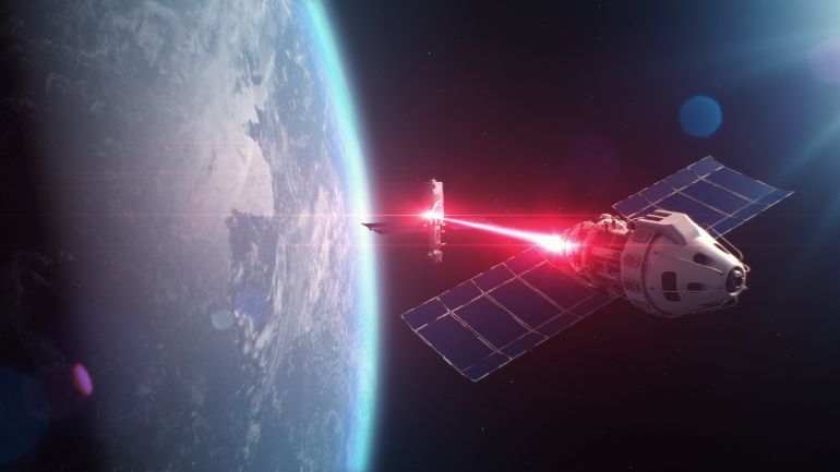 shu4412379-1763887966 3D VFX rendering of satellite attacking another satellite with laser weapon in space on Earth planet orbit. Escalation of political conflict and arms race in cosmos. Nuclear war and. 3D Illustration