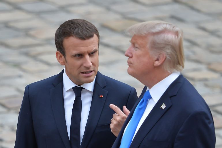 shutte80bj-1776944972 Mandatory Credit: Photo by Hahn Lionel/ABACA/Shutterstock (13367980bj)<br />French President Emmanuel Macron welcomes US President Donald Trump at Les Invalides As part of the commemoration of the 100th anniversary of the entry of the United States of America into World War I on July 13, 2017 in Paris, France.<br /> President Trump's Visit - Welcome Ceremony At Les Invalides - Paris, France - 13 Jul 2017 (شترستوك)