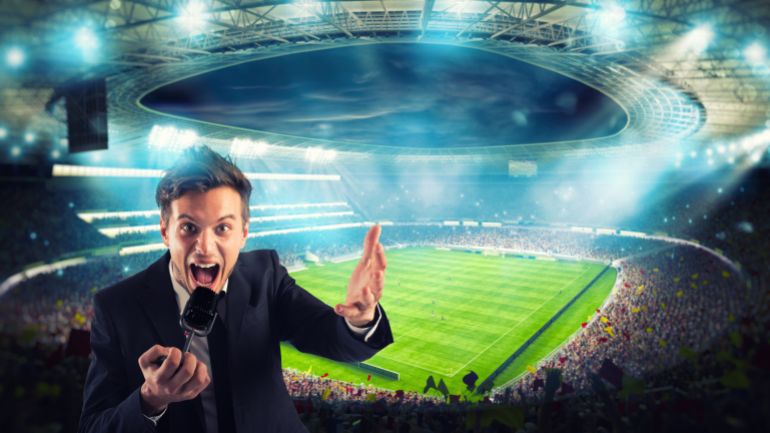 Sports journalist comments on a football match at the stadium