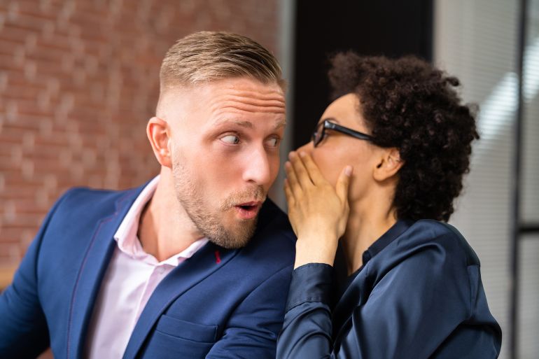 shutterstock_2153663519-1778686977 Portrait Of Happy Woman Whispering Secret Or Interesting Gossip To Handsome Man In His Ear; Shutterstock ID 2153663519; purchase_order: aj; job: eed; client: e; other:
