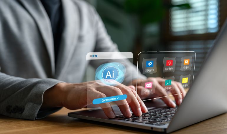 shutterstock_2618740019-1780228552 Businessman using laptop with AI content generation platform, smart application dashboard, and digital innovation tools for business productivity, creativity, and artificial intelligence technology.