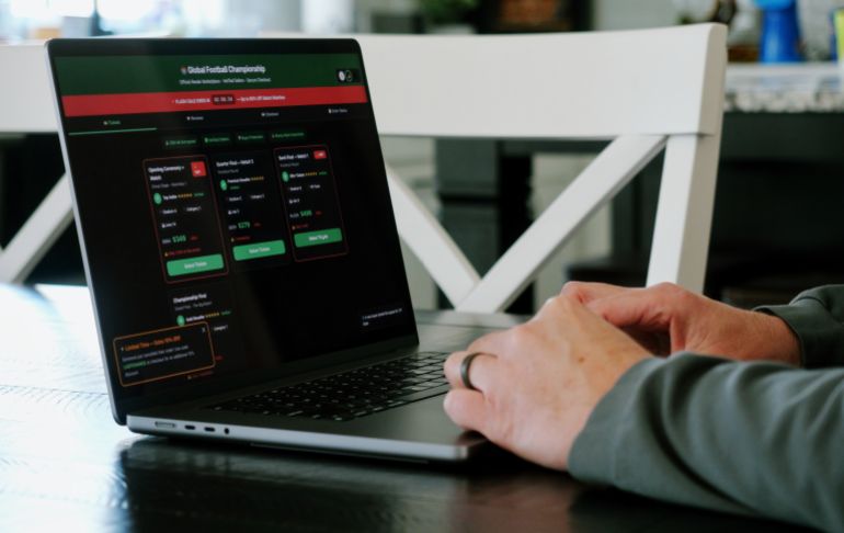 Man Tries to Buy World Global Soccer Tournament Tickets Online from Potential Scam Website - Fraudulent Football Sports Ticket Concept