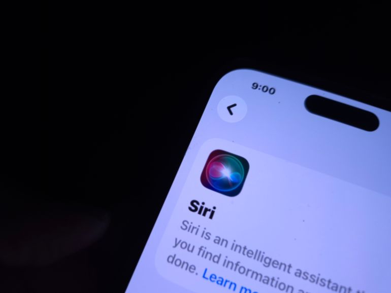 Bangalore, India - March, 21, 2026: Close up image of a iPhone with Siri Application Settings, Apple Intelligence or Siri A Virtual Intelligent assistant built in the smartphone, Cyberspace and Tech.