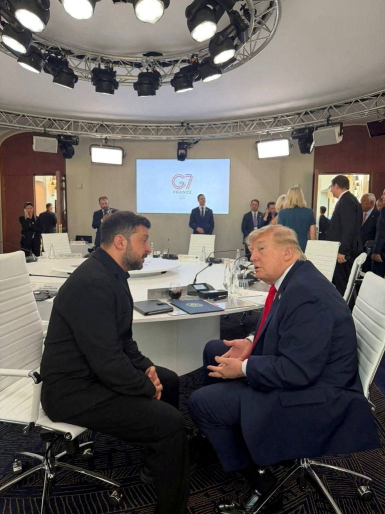 zelenskiy-1781642267 U.S. President Donald Trump and Ukraine's President Volodymyr Zelenskiy speak to each other during the G7 summit in Evian-les-Bains, France, June 16, 2026. Ukrainian Presidential Press Service/Handout via REUTERS ATTENTION EDITORS - THIS IMAGE HAS BEEN SUPPLIED BY A THIRD PARTY. TPX IMAGES OF THE DAY