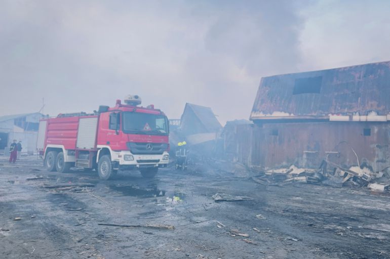 Smoke rises as firefighters work to extinguish a fire at the site of a drug users rehabilitation hospital destroyed in what the Taliban said was a Pakistani air strike in Kabul, Afghanistan, March 17, 2026. Picture taken with a mobile phone. REUTERS/Sayed Hassib