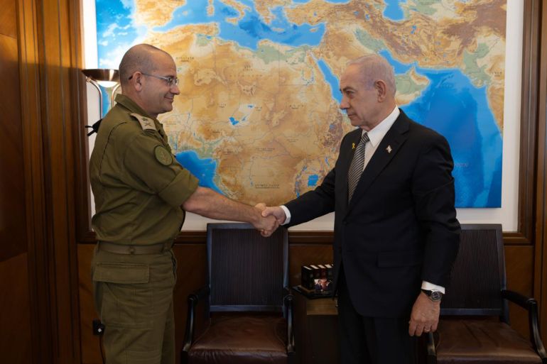 003-1764863078 Prime Minister Benjamin Netanyahu (right) shakes hands with Maj. Gen. Roman Gofman, his military secretary, whom he nominated on December 4, 2025, to be the next director of the Mossad.