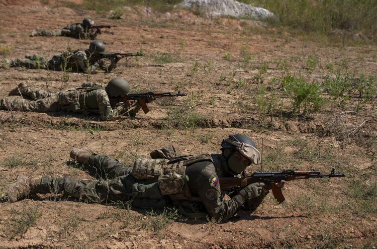 DONETSK OBLAST, UKRAINE - AUGUST 15: Colombian mercenaries, fighting for Ukraine, practice target shooting on the training ground on August 15, 2023 in Donetsk Oblast, Ukraine. Not only military volunteers from other countries are fighting for Ukraine, but also hundreds of Colombian mercenaries. Colombian fighters are increasingly drawn to Ukraine because the pay they receive there is much higher than what is normally paid in Colombia. Colombia is fertile ground for recruitment because it has the largest army in South America - after decades of fighting Marxist rebels and drug cartels. (Photo by Viktor Fridshon/Global Images Ukraine via Getty Images)