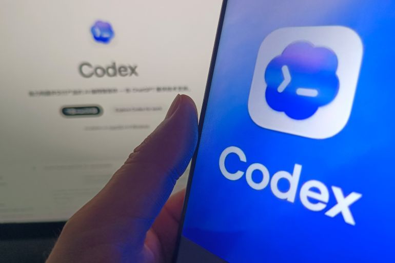 574-1784287698 SUQIAN, CHINA - JUNE 3, 2026 - A netizen is using his mobilephone to view Codex logo and using his computer to view Codex webpage in Suqian, Jiangsu, China on June 3, 2026. (Photo credit should read CFOTO/Future Publishing via Getty Images)