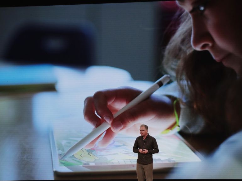 CHICAGO, IL - MARCH 27: Greg Joswiak, vice president of product marketing at Apple, talks about the new iPad during an event at Lane Tech College Prep High School on March 27, 2018 in Chicago, Illinois. The device will work with Apple Pencil and is available today. Scott Olson/Getty Images/AFP== FOR NEWSPAPERS, INTERNET, TELCOS & TELEVISION USE ONLY ==