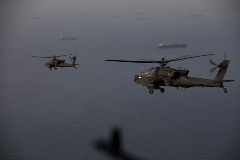 afo-2-1781635347 This handout photo released by US Central Command via their X account (@CENTCOM) on April 18, 2026 shows AH-64 Apaches flying above the Strait of Hormuz during a patrol on April 17, 2026. Iran's military declared the Strait of Hormuz closed again on April 18, prompting ships to abandon attempts to transit and President Donald Trump to warn Tehran against trying to "blackmail" the United States. On April 17, Tehran had declared the strait, which usually carries a fifth of the world's oil and liquefied natural gas, open after a ceasefire was agreed in Israel's war with Iran's ally Hezbollah in Lebanon. (Photo by US Central Command (CENTCOM) / AFP) / RESTRICTED TO EDITORIAL USE - MANDATORY CREDIT "AFP PHOTO / US CENTRAL COMMAND " - HANDOUT - NO MARKETING NO ADVERTISING CAMPAIGNS - DISTRIBUTED AS A SERVICE TO CLIENTS