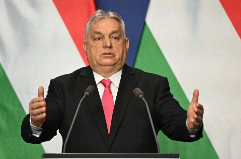 afp_695b9d1974e7-1767611673 Hungary's Prime Minister Viktor Orban answers a journalist's question during his press conference in the Carmelita monastery, the office of the Hungarian premier, in Budapest, Hungary, on January 5, 2026. (Photo by Attila KISBENEDEK / AFP)