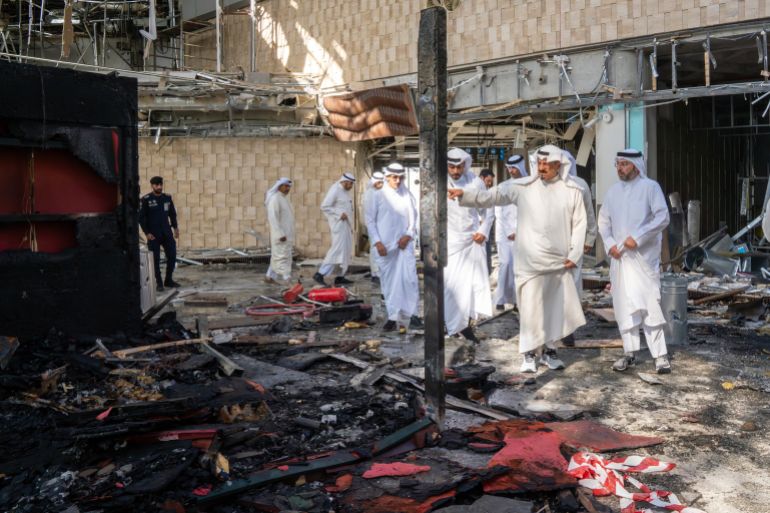 afp_6a204946e39d-1780500806 This handout photo provided by the Kuwaiti News Agency (KUNA) on June 3, 2026 shows Kuwaiti Prime Minister Sheikh Ahmad al-Abdullah al-Sabah (2R) inspecting the damaged airport after an Iranian attack, in Kuwait City.