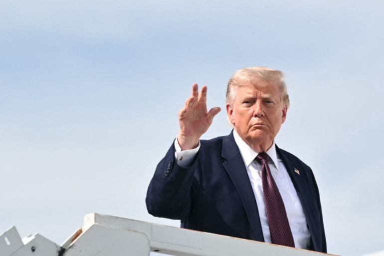 afp_6a3b2cd9588d-1782263001 US President Donald Trump waves as he boards Air Force One before departing from Reading Regional Airport (RDG) in Berks County, Pennsylvania on June 23, 2026.