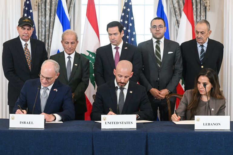 afp_6a466ad6a9f4-1782999766 US Secretary of State Marco Rubio (C, back) looks on as (L/R, front row) Israeli Ambassador to the US Yechiel Leiter, State Department Chief of Staff Daniel Holler, and Lebanese Ambassador to the US Nada Hamadeh sign a framework agreement at the US Department of State in Washington, DC, on June 26, 2026.