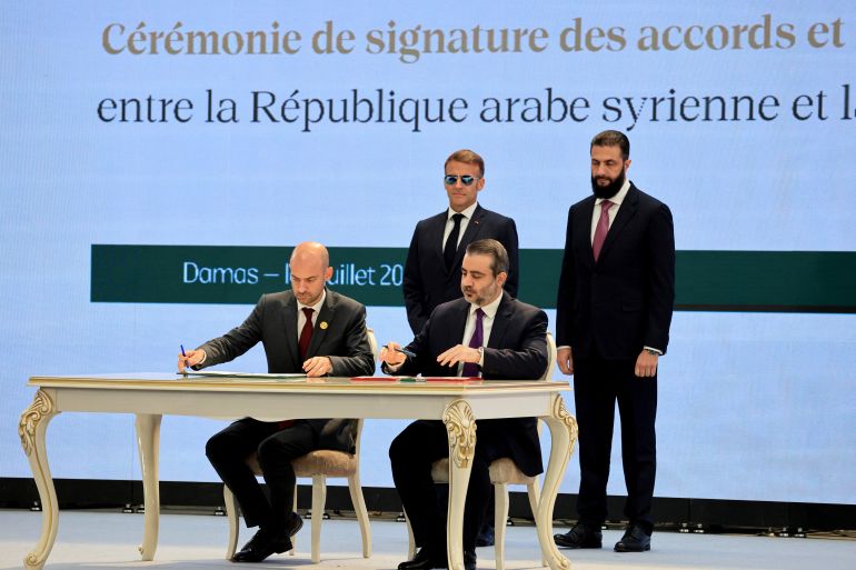afp_6a4cf0cdd227-1783427277 France's Foreign Affairs Minister Jean-Noel Barrot (L) and Syria's Foreign Minister Asaad al-Shaibani (2nd R) sign the Framework Agreement on Bilateral Cooperation flanked by France's President Emmanuel Macron (2nd L) and Syria's Foreign Minister Asaad al-Shaibani during an agreement signing ceremony in Damascus on July 7, 2026.