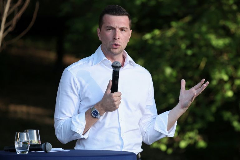 afp_6a4d127d74ee-1783435901 French far-right party Rassemblement National (RN) president Jordan Bardella addresses the audience during a RN party event "La fete champetre" in Lievin, northern France on July 4, 2026. (Photo by SIMON WOHLFAHRT / AFP)