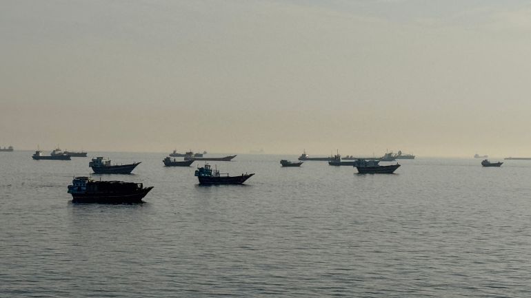 afp_6a53c80bedcd-1783875595-1 (FILES) Vessels are seen anchored in the Strait of Hormuz, off the port city of Khasab on Oman’s northern Musandam Peninsula on May 17, 2026.
