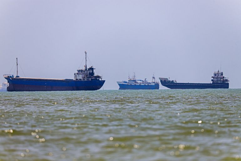 (FILES) In this picture obtained from Iran's ISNA news agency on June 18, 2026, vessels are seen anchored in Bandar Abbas along the Strait of Hormuz.