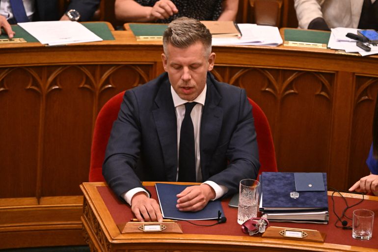 afp_6a55c39dc747-1784005533 Hungarian Prime Minister Peter Magyar votes on a constitutional amendment at the extraordinary session of parliament at the House of Representatives in Budapest, Hungary on July 13, 2026.