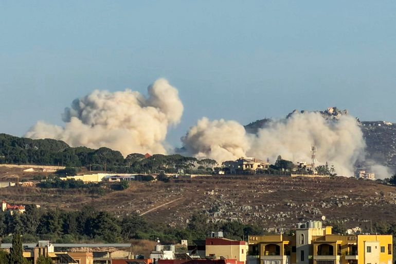 afp_6a5c0653dd03-1784415827 Smoke rises following Israeli controlled-explosions in the village of Kfar Tibnit as seen from Nabatieh in southern Lebanon on July 18, 2026.
