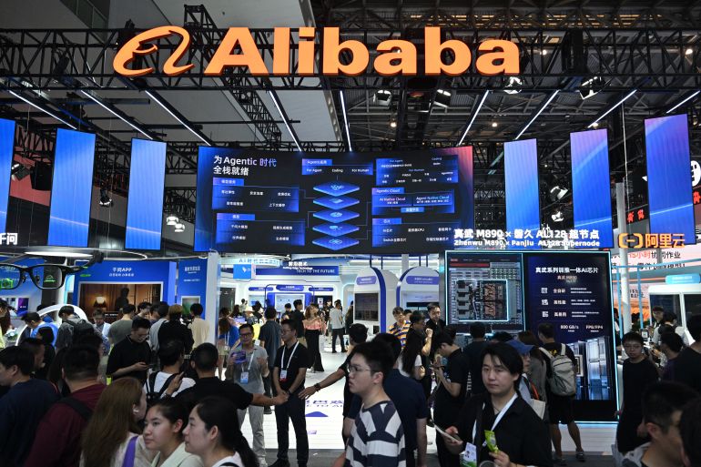afp_6a5dfd440eda-1784544580 People visit the Alibaba booth during the World Artificial Intelligence Conference (WAIC) in Shanghai on July 18, 2026. (Photo by Hector RETAMAL / AFP)