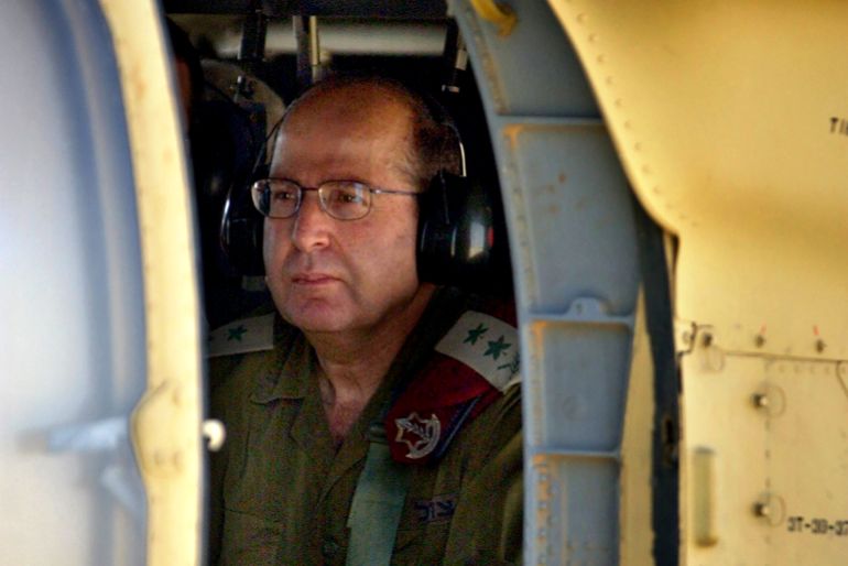 ap04051302479-1785047161 Israel's military chief, Lt. Gen. Moshe Yaalon sits in an army helicopter before taking off from an army base just outside the Gaza Strip after visiting Israeli troops operating in the area of the Palestinian town of Rafah next to the Egyptian border Thursday, May 13 2004. Israel was operating in the area following an attack on an Israeli armored vehicle Wednesday that killed five soldiers. Yaalon said that Egypt is assisting in the search for body parts of the soldiers killed. (AP Photo/Ariel Schalit)