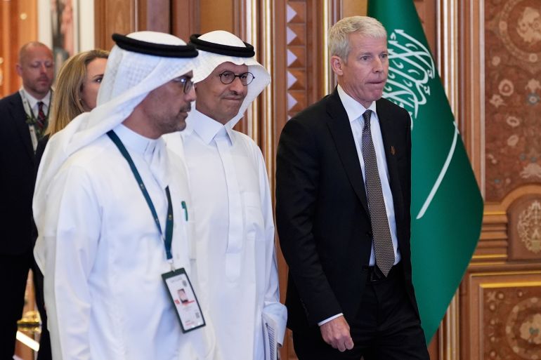 U.S. Secretary of Energy Chris Wright, right, and Saudi Energy Minister Prince Abdulaziz bin Salman arrive at the King Abdulaziz International Conference Center in Riyadh, Saudi Arabia, Tuesday, May 13, 2025. (AP Photo/Alex Brandon)