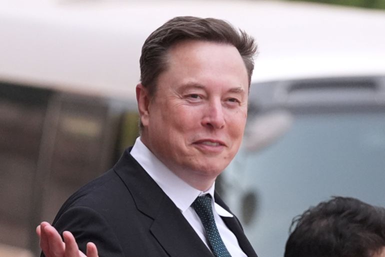FILE - Elon Musk departs after a welcome ceremony with President Donald Trump and China's President Xi Jinping at the Great Hall of the People, Thursday, May 14, 2026, in Beijing. (AP Photo/Mark Schiefelbein, File)