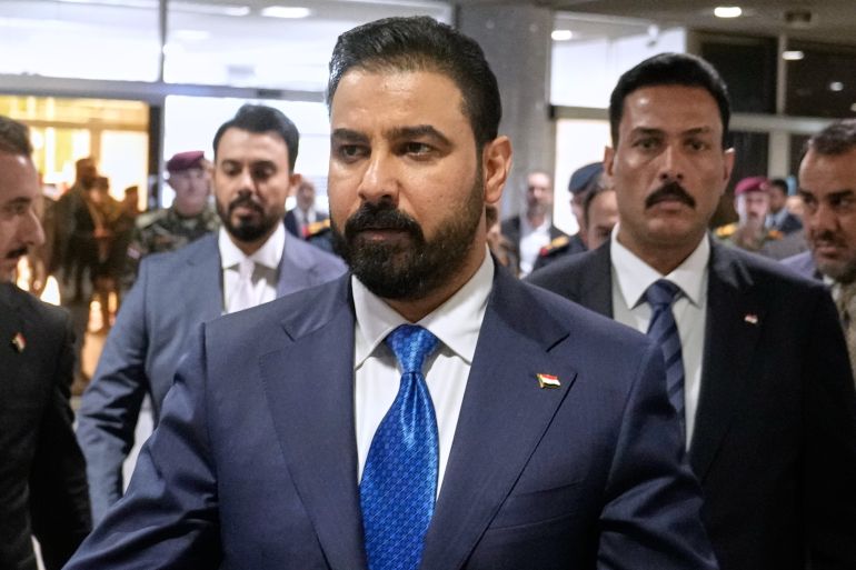 ap_6a5600a1a991b-1784021153 FILE - Iraq's Prime Minister-designate Ali al-Zaidi arrives at the Iraqi parliament to attend the voting of his government in Baghdad, Iraq, May 14, 2026. (AP Photo/Hadi Mizban, File)