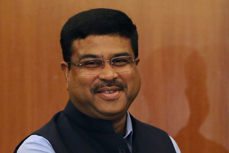 FILE- India's Petroleum Minister Dharmendra Pradhan smiles at the end of a joint press conference in New Delhi, India, Tuesday, April 17, 2018. (AP Photo/Altaf Qadri, File)