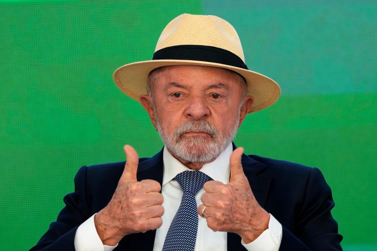 ap_6a66952e9ae73-1785107758 Brazilian President Luiz Inacio Lula da Silva flashes two thumbs-up during a ceremony to sign a bill allocating funds for credit lines under a program that supports Brazilian companies affected by U.S. tariffs, in Brasilia, Brazil, Wednesday, July 22, 2026. (AP Photo/Eraldo Peres)