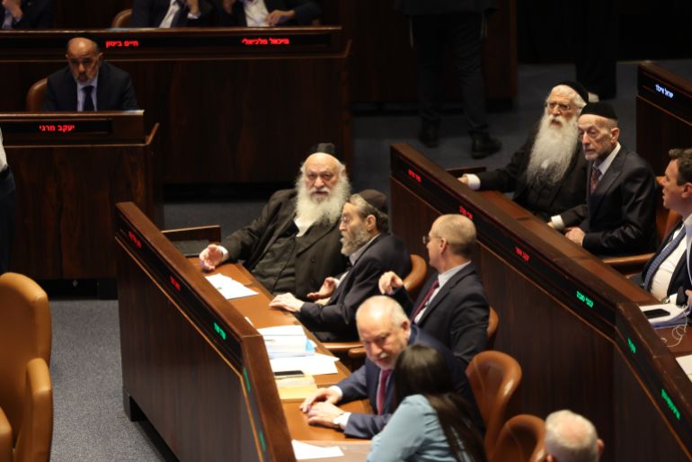 epa_6a57a233b1b3-1784128051 epa13109187 Knesset members vote on the Basic Law proposal, 'Torah Study,' at the Knesset, Israel's parliament, in Jerusalem, 13 July 2026. EPA/ABIR SULTAN