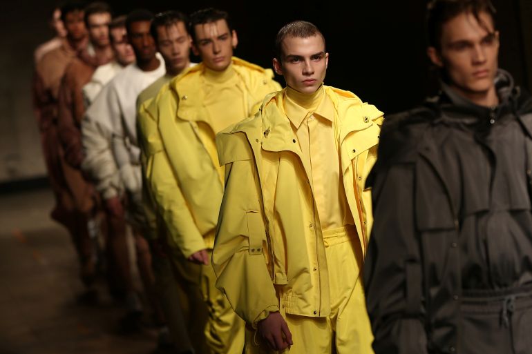 fasion-show-3-1784828504 Models present creations at the MAN catwalk show during London Fashion Week Men's 2017 in London, Britain January 6, 2017. REUTERS/Neil Hall