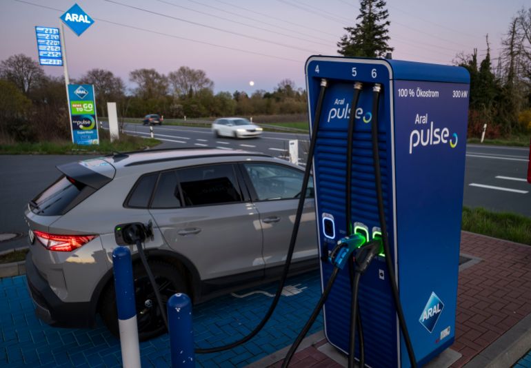 getty_69ceb592e7-1775154578 MOERFELDEN-WALLDORF, GERMANY - APRIL 01: A driver is charging his electric car at an Aral gas station on April 01, 2026 in Moerfelden-Walldorf, Germany. Electric car dealerships in Germany are reporting a rise in interest among buyers following the spike in gasoline prices due to the ongoing U.S.-Israeli war with Iran. (Photo by Thomas Lohnes/Getty Images)