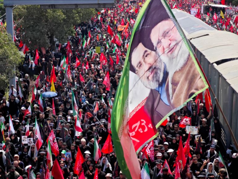getty_6a50b167c3-1783673191 TEHRAN, IRAN - JULY 06: Mourners gather with flags to pay final respects to Iran's slain Supreme Leader Ayatollah Ali Khamenei during the third day of his funeral ceremonies on July 06, 2026 in Tehran, Iran. Khamenei and members of his family were killed on February 28 during U.S.-Israeli strikes at the beginning of the war, bringing an end to his 36-year rule over Iran. A multi-city state funeral will be held over six days before his body is laid to rest on July 9, in his hometown of Mashhad, Iran. (Photo by Majid Saeedi/Getty Images)