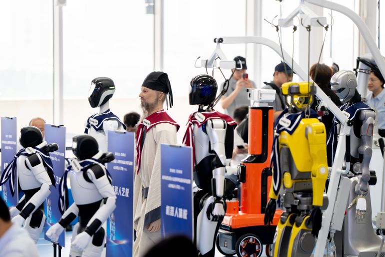 HANGZHOU, CHINA - JUNE 29: Robot students are displayed during the opening ceremony of Hangzhou Robot School on June 29, 2026 in Hangzhou, Zhejiang Province of China. The school offers four programs - technical, nursing, arts and sports - providing all-around training in robots' capabilities, from ethics and safety, perception and motion performance to aesthetic expression and hands-on scenario operation. (Photo by VCG/VCG via Getty Images)