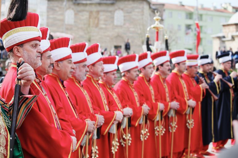 gettyimages-458736209-1783544026 جوقة المهتر التركية العثمانية "BURSA, TURKEY - April 9, 2011: Traditional Ottoman-Turkish Janissary Band called ""mehter"" members holding little bells. Ottoman military band is the oldest variety of military marching band in the world, today mehteran is performing only at ceremonial events"
