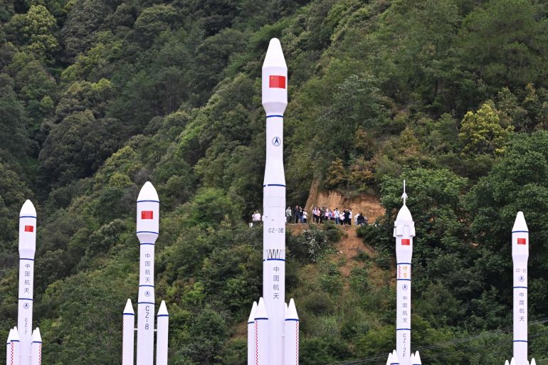 pic-98881123-1776655853 Models of Chinese rockets are seen as people leave after watching a Long March 2-C rocket carrying a satellite jointly developed by China and France dubbed the Space Variable Objects Monitor (SVOM), lift off from a space base in Xichang, in Chinas southwestern Sichuan province on June 22, 2024. (Photo by ADEK BERRY / AFP)