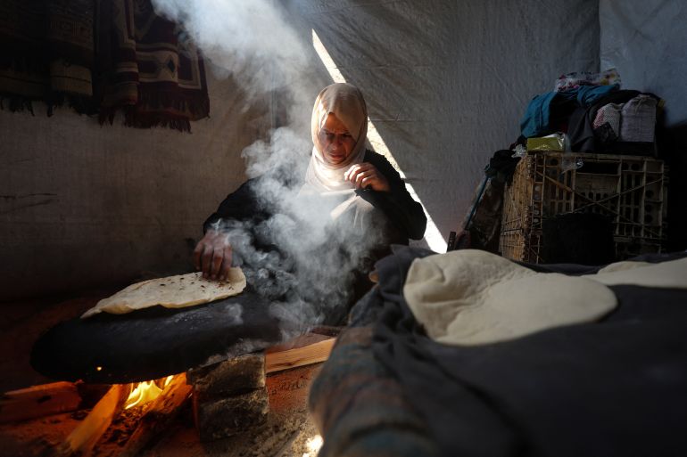reuters_68f8aef5-1761128181 Iman Abdel Halim Abu Mutlaq, the displaced mother of Palestinian twin boys Uday and Hamza Abu Odah, bakes bread inside their tent where they shelter, in Mawasi area, in Khan Younis in the southern Gaza Strip, September 12, 2025. Uday and Hamza were born on 2 November 2023, less than four weeks after the Hamas attack that triggered Israel's devastating assault on Gaza that has defined and encompassed their brief lives. They have lost their home and lived in tents and on the street. Their father was killed seeking aid and two brothers were wounded. They have suffered constant hunger, frequent bouts of sickness and repeated episodes of terrifying bombardment. Their mother is frightened that the longer Israel's assault goes on, the more they - and the new generation of Gazans - will be scarred. "We are afraid this war will never stop, that it has a beginning and no end," she said. REUTERS/Ramadan Abed SEARCH "GAZA TWINS ODAH" FOR THIS STORY. SEARCH "WIDER IMAGE" FOR ALL STORIES.