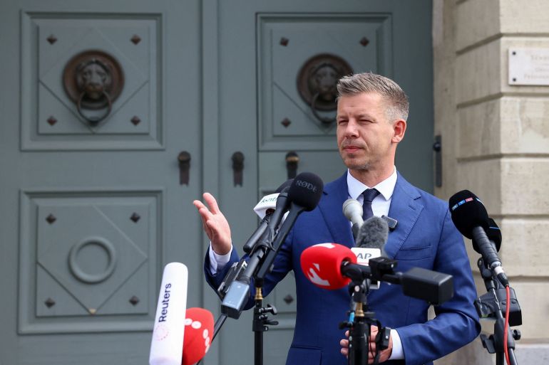 reuters_69dfd30e-1776276238 Peter Magyar, leader of the Hungarian opposition Tisza Party, speaks on the day of a meeting with Hungary's President Tamas Sulyok, following the parliamentary election, which Tisza won, at Sandor Palace in Budapest, Hungary, April 15, 2026. REUTERS/Bernadett Szabo