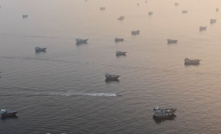reuters_6a30075f-1781532511 A drone view shows vessels in the Strait of Hormuz, as seen from Musandam, Oman, June 15, 2026. REUTERS/Stringer TPX IMAGES OF THE DAY