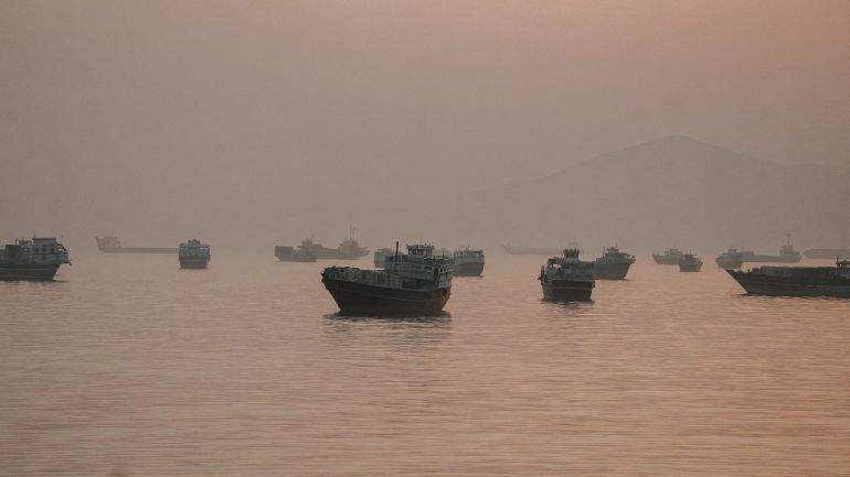 reuters_6a48de02-1783160322-2 FILE PHOTO: Vessels are anchored in the Strait of Hormuz as seen from Musandam, Oman, June 3, 2026. REUTERS/Stringer/File Photo//File Photo