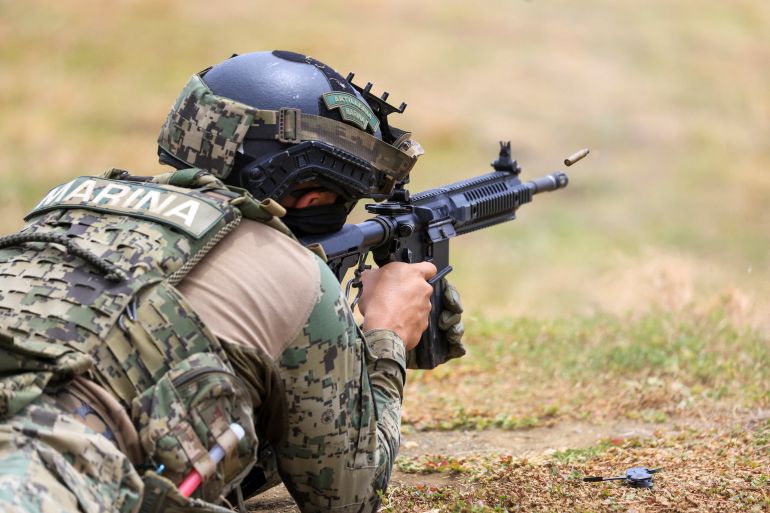 reuters_6a4b881e-1783334942 A member of the Mexican Naval Infantry Corps particiaptes in a live fire exercise as part of the Rim of the Pacific (RIMPAC) military exercises held at the Marine Corps Base Hawaii (MCBH) in Kaneohe, Hawaii, U.S., June 27, 2026. REUTERS/Marco Garcia